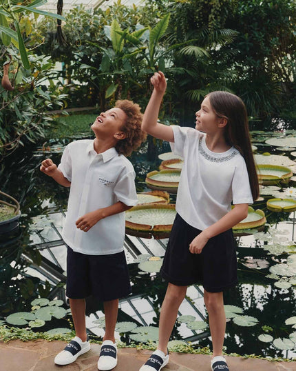 boy wearing Givenchy blue Jacket at Kids Atelier