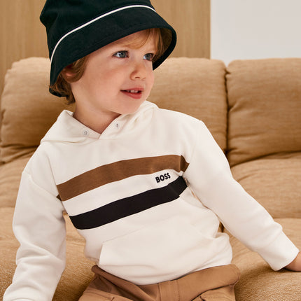 Boss Kid wearing hat at kids atelier