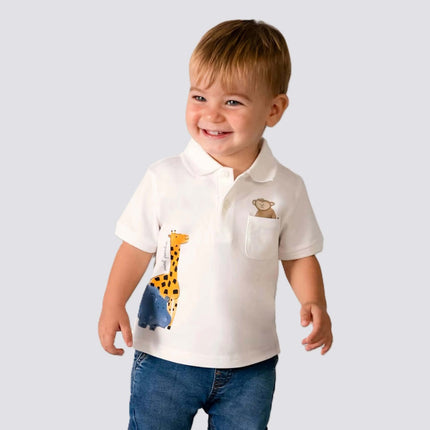 boy wearing baby clothing from kids atelier posing in desert promoting end of season sale 