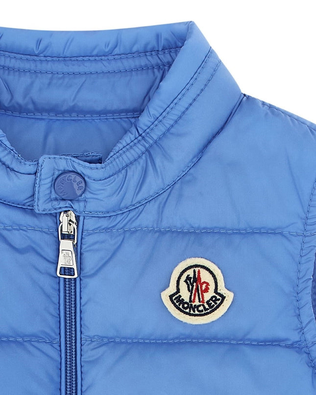 Kids Atelier Close-up of a blue puffer vest
